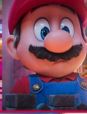 Movie still: Mario, full cap and all, face to face with a tiny caged Bowser